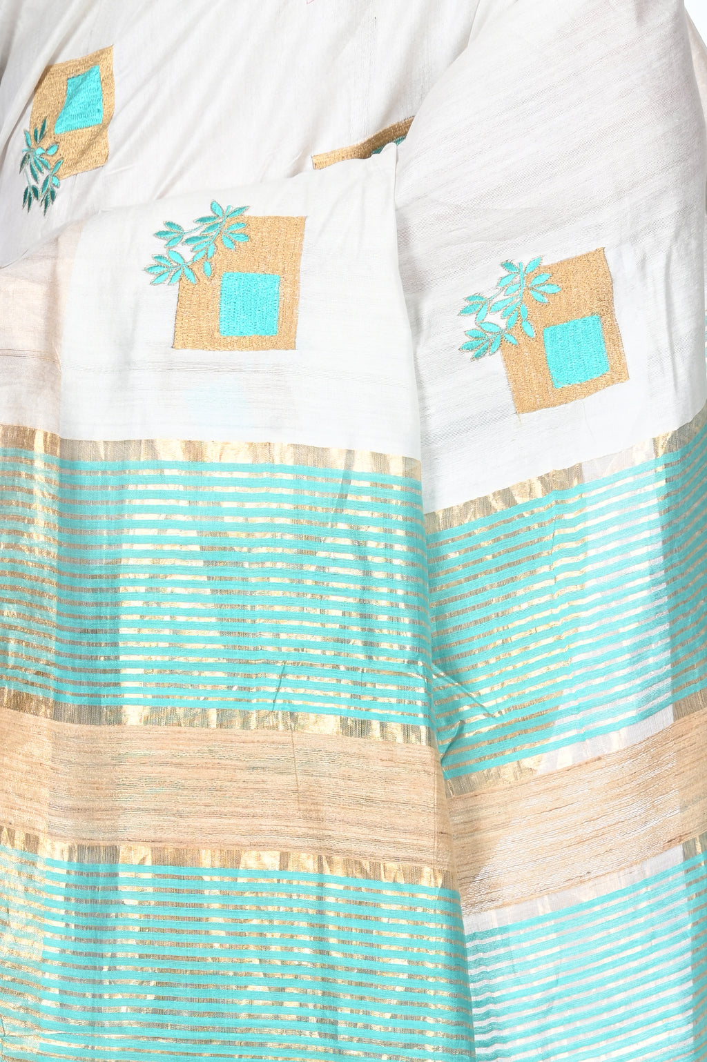 Full Body Embroidery Work on White Semi Tussar Silk Saree with Gheecha anchal and Zari Border